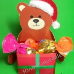Новогодняя поделка «Медвежонок с подарком»