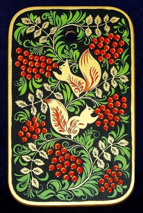 A wooden chopping board with folk Khokhloma painting from Russia. A pattern with squirrels eating Rowan berries. #art #folk #painting #Russian