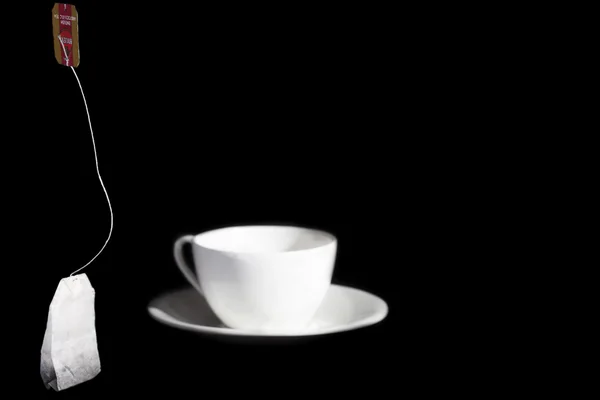 Кубок белый на черном фоне — стоковое фото